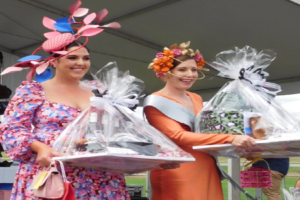 Millinery Masterpiece runner-up, Bonnie Cox (left) with the winner, Karly Rubins