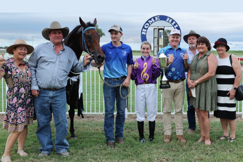 Winning combination of owners, trainers and jockey Kelsey Lenton with Let’s Torque a Deel after their Burdekin Cup success.