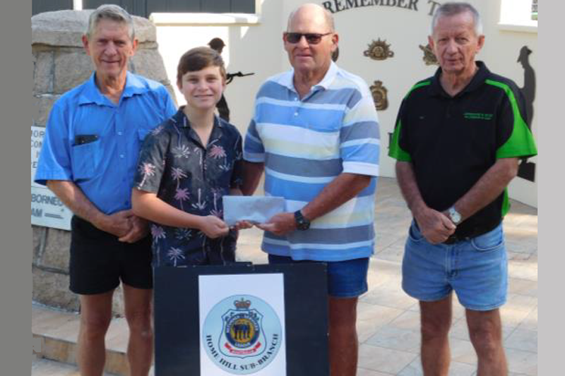 Student volunteer, Ethan Pengelly presented his $410 return from sales of badges, poppies and avocadoes to Home Hill RSL Sub-Branch officers (from left) Secretary Alan Petersen, President Richard Kelly and Uli Liessmann.