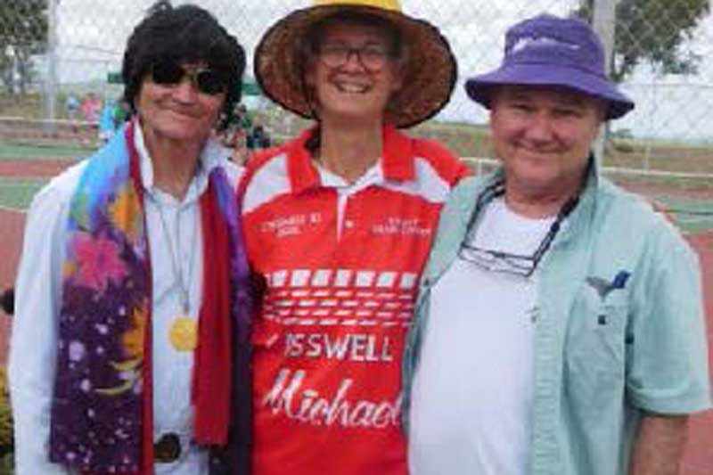 Kate Casswell with Townsville Hospital Cancer Ward supporters, JJ Jarrod (left) and Dr Michael Collins.